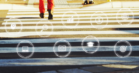 Image of multiple digital icons against low section of man crossing the street. Computer interface...