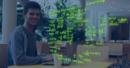 Image of data processing over caucasian male student. Global education, learning, school, digital interface and data processing concept digitally generated image.の写真素材