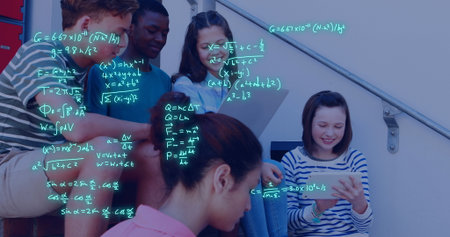 Image of equations and data processing over diverse students. Global education, learning, school, digital interface and data processing concept digitally generated image.の写真素材