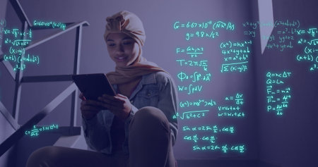 Image of scientific data processing over biracial female student. Global education, learning, school, digital interface and data processing concept digitally generated image.の写真素材