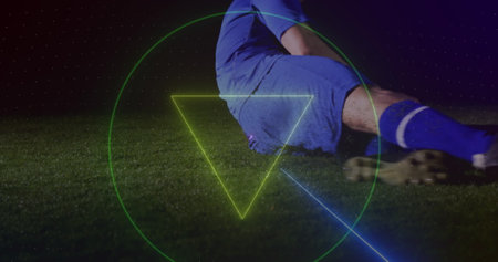 Image of neon shapes over caucasian male soccer player. global sport and digital interface concept digitally generated image.の写真素材