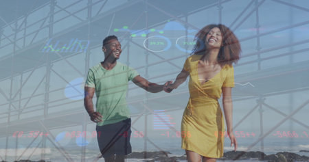 Image of hud interface, low angle view of bridge, african american couple running at beach. Digital...