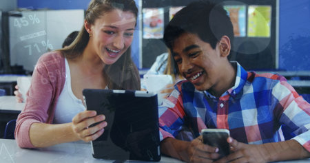 Image of data processing over diverse girl and boy using digital tablet together at school. School...