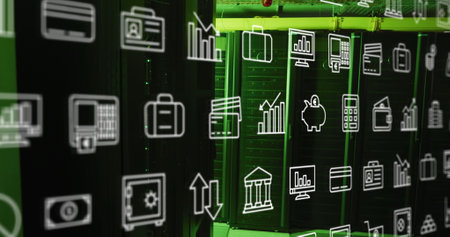 Repeated business and media icons moving over green lit computer servers in dark server room. Communication network, data and digital interface technology, digitally generated image.の写真素材