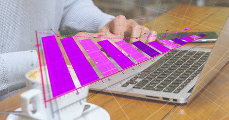Image of financial chart over biracial man using laptop. Global connections, technology and digital...