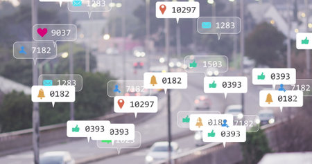 Image of notification icons with counters over slow motion of cars moving on street in city. Digital composite, multiple exposure, social media, speech bubble, number, transportation.の写真素材