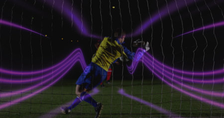 Image of red text happy new year over scope and football player. Sports and competition concept digitally generated image.の写真素材