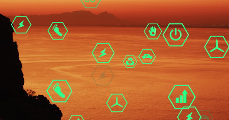 Image of sustainability and ecology icons over landscape. Ecology, sustainability and data processing concept digitally generated imageの写真素材