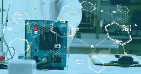 Image of data processing over caucasian male scientist in lab. global science and digital interface concept digitally generated image.の写真素材