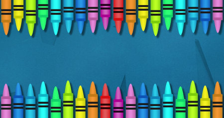 Image of multiple colourful crayons on top and bottom over blue background. Global science learning education concept digitally generated image.の写真素材