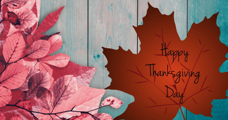 Image of happy thanksgiving day text over leaves. Thanksgiving day and celebration concept digitally generated image.の写真素材