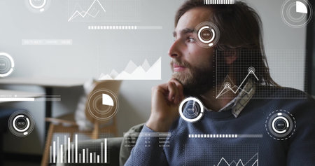 Image of infographic interface over caucasian businessman thinking and looking away in office. Digital composite, business, report, progress, pensive, ideas, planning, beard, portrait and office.の写真素材