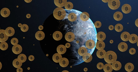 Image of falling bitcoins over spinning globe. Global business, finances, digital interface and connections concept digitally generated image.の写真素材