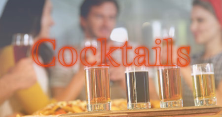 Image of red cocktails neon text over diverse friends drinking and talking in bar. National night out day, party and celebration concept digitally generated image.の写真素材