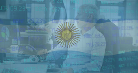 Image of flag of argentina over stock market and diverse business people in office. Global business, patriotism and digital interface concept digitally generated image.の写真素材