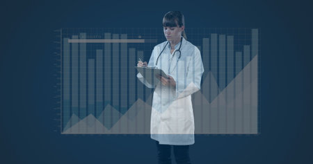 Image of statistics and data processing over female doctor. Global medicine, healthcare services, computing, finance, business and data processing concept digitally generated image.の写真素材
