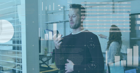 Image of infographic interface, smiling caucasian man talking on speaker of cellphone in office....