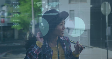 Image of data processing over biracial woman using smartphone. Global business, computing, digital...