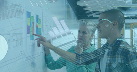 Image of data processing against diverse man and woman discussing over memo notes at office. Computer interface and business data technology conceptの写真素材