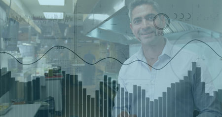 Caucasian male colleague analyzing data on transparent screens. Wearing white shirt, displaying...