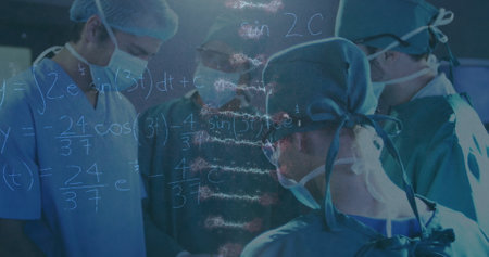 Image of rotating dna over caucasian female and male surgeons in face masks during operation. health, medicine, science and technology concept digitally generated image.の写真素材