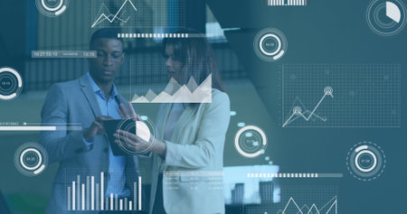 Image of data processing against diverse businessman and businesswoman discussing at office....