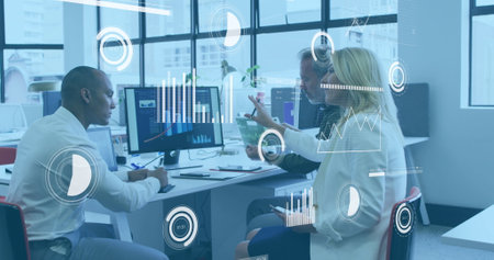Image of statistical data processing against diverse colleagues over a computer at office. Computer...