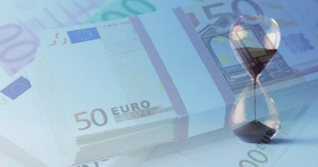 Image of euro currency banknotes over hourglass. Global currency, business, finances, computing and data processing concept digitally generated image.の写真素材