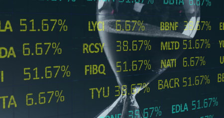 Image of financial data processing over hourglass. Global business, finances, computing and data...