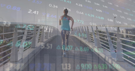 Image of financial data processing over caucasian woman running. Global sports, business, finances, computing and data processing concept digitally generated image.の写真素材