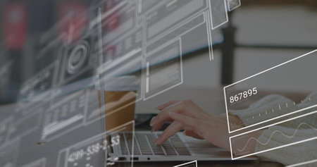 Image of data processing over hands using laptop. Global business and digital interface concept...
