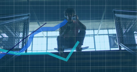 Image of financial data processing over biracial man using smartphone. Global business, finances and...
