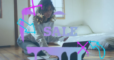 Image of sale text banner against caucasian woman calculating finance using laptop at home. Family...