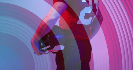 Image of caucasian american football player and flag of usa. American patriotism, sports and...