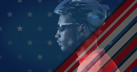 Image of flag of usa over african american male cyclist. Global sports, competition and patriotism concept digitally generated image.の写真素材