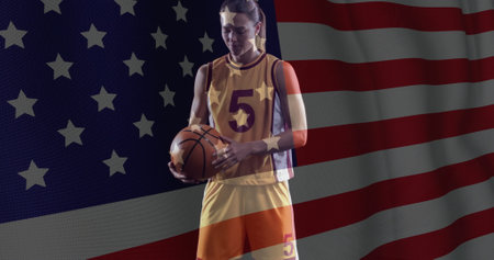 Image of flag of usa over caucasian female basketball player. Global sports, sport disciplines and flags concept digitally generated image.の写真素材