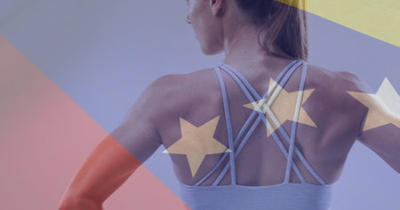 Image of flag of venezuela over caucasian female athlete. Global sports, sport disciplines and flags concept digitally generated image.の写真素材