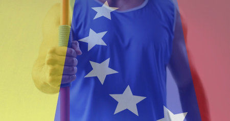 Image of flag of venezuela over biracial male athlete. Global sports, sport disciplines and flags concept digitally generated image.の写真素材