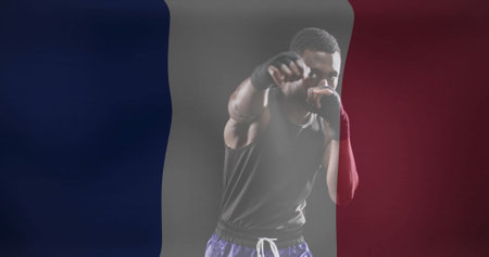 Image of flag of france over african american male boxer. Global sports, competition and patriotism concept digitally generated image.の写真素材