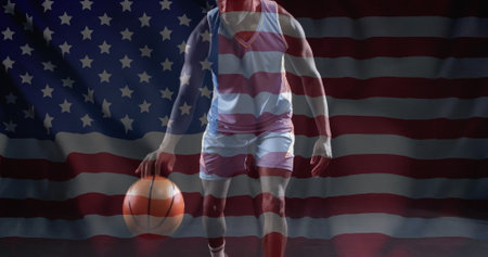 Image of flag of usa over african american male basketball player. Global sports, competition and patriotism concept digitally generated image.の写真素材