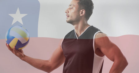 Image of flag of chile over biracial male volleyball player. Global sports, sport disciplines and flags concept digitally generated image.の写真素材