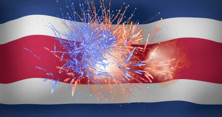 Image of fireworks exploding over flag of costa rica. Sports, winning and celebration concept digitally generated image.の写真素材