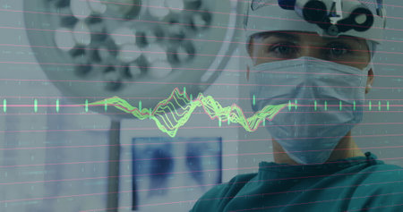 Image of data processing over caucasian male surgeon. Global medicine, connections, computing and data processing concept digitally generated image.の写真素材