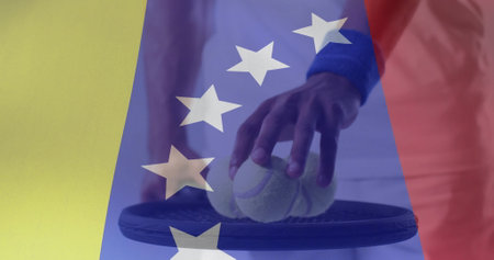 Image of flag of venezuela over african american male tennis player. Global sports, sport disciplines and flags concept digitally generated image.の写真素材