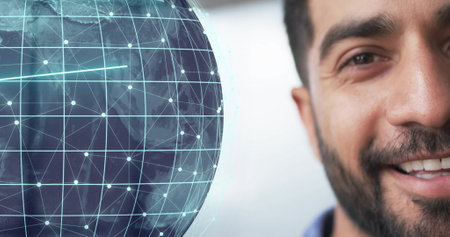 Image of globe and data processing over biracial businessman in office. Global finance, business, connections, computing and data processing concept digitally generated image.の写真素材