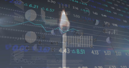 Image of financial data processing over lit match. Global finance, business, connections, computing and data processing concept digitally generated image.の写真素材