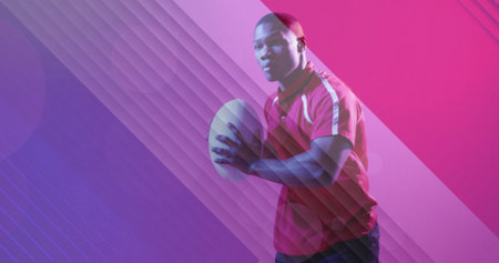 Image of flag of france over african american male rugby player running. Sports, competition and active lifestyle concept digitally generated image.の写真素材
