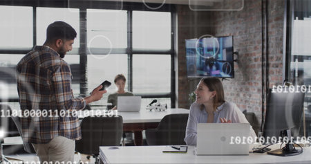 Image of digital icons and data processing over diverse business people in office. Global finance,...