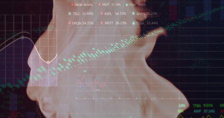 Image of financial data processing over flames. Global finance, business, connections, computing and data processing concept digitally generated image.の写真素材