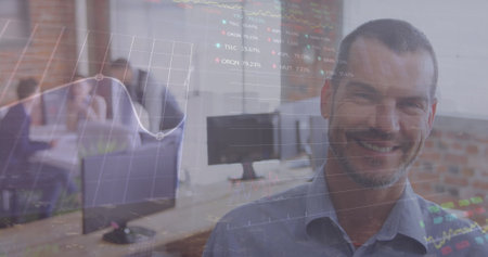 Image of stock market data processing over caucasian man smiling at office. Global economy and...